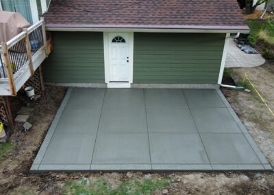 Broomed Patio w/ Stamped Boarder construction, by Major Oaks Hardscape in MN