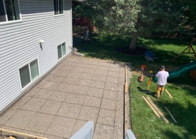 Broomed Patio w/ Stamped Boarder construction, by Major Oaks Hardscape in MN